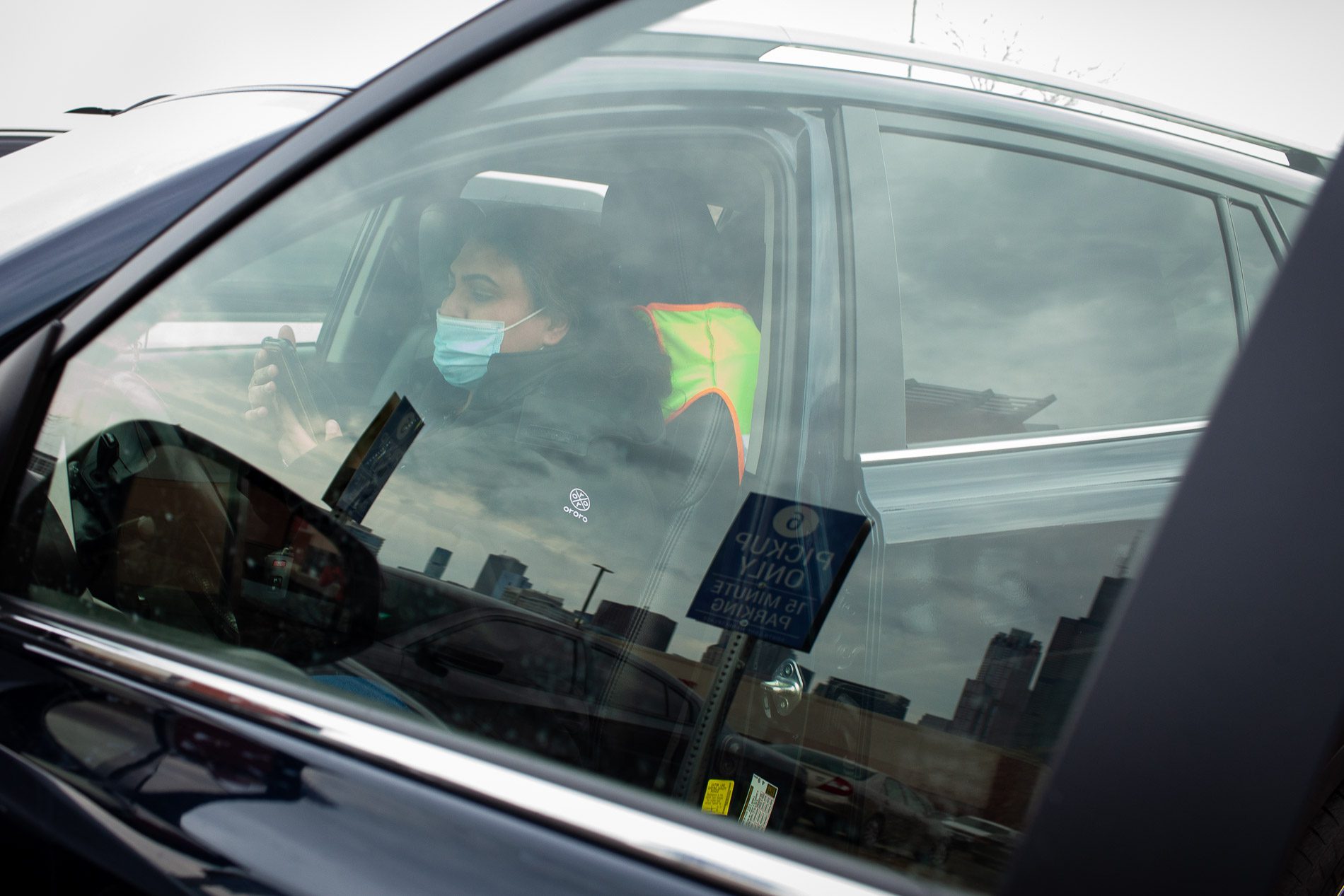 Naveen Ali in her car while delivering food for Grubhub