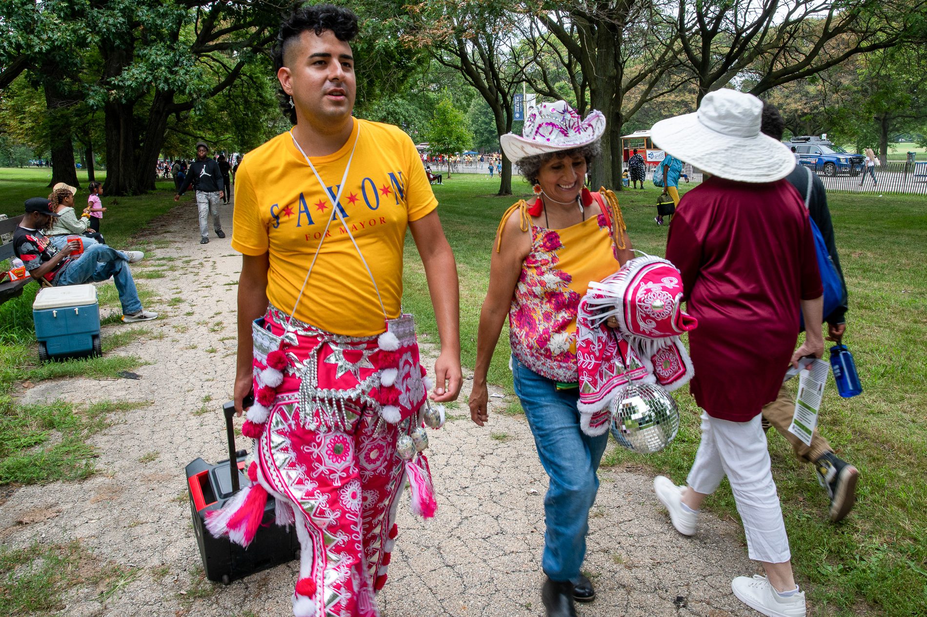 J. Saxon and their mom, Elizabeth Saxon, attend the Bud Billiken Parade