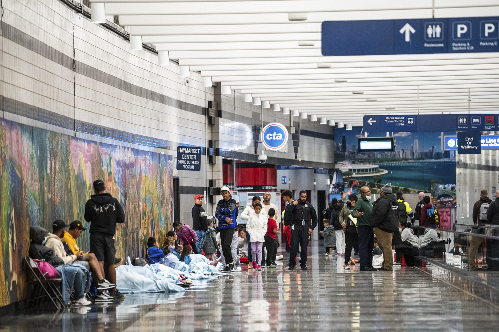 Migrants Sent From Texas Sleeping At O’Hare Borderless